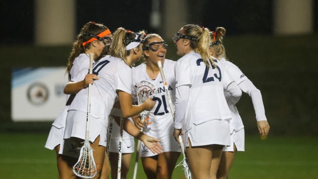 Virginia women's lacrosse celebrates after scoring a goal against Richmond at Klockner Stadium.